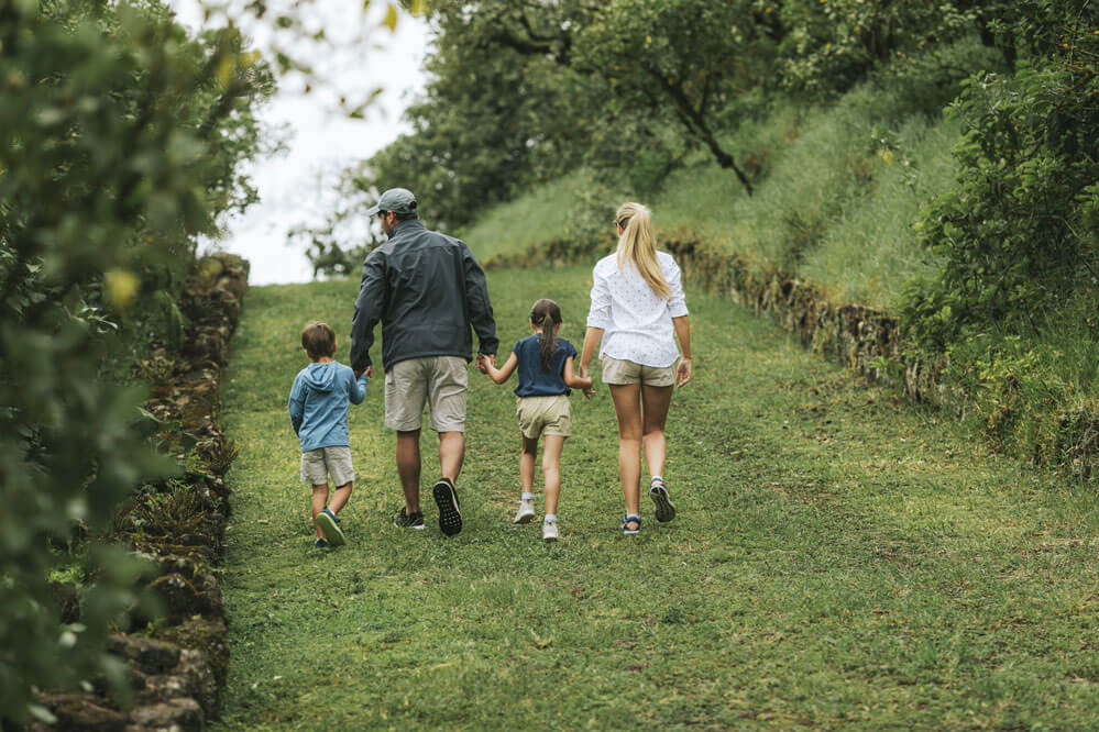 Family walking through Santa Cruz island