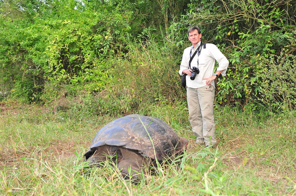 Photographer with turtle